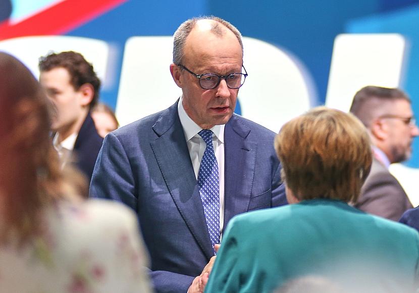 Merkel wirbt für Geduld mit Regierung Merz